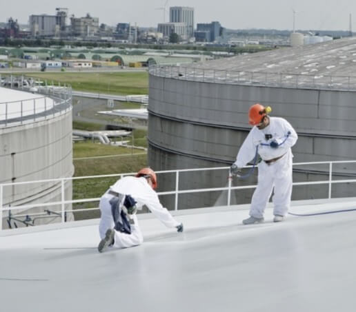 Figure 3. Spraying a thermal insulating coating on a tank roof.