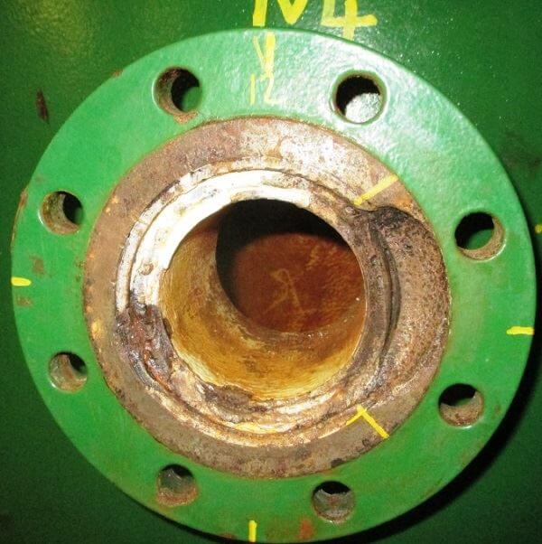 Figure 4. Corroded 4" flange face before composite repair.