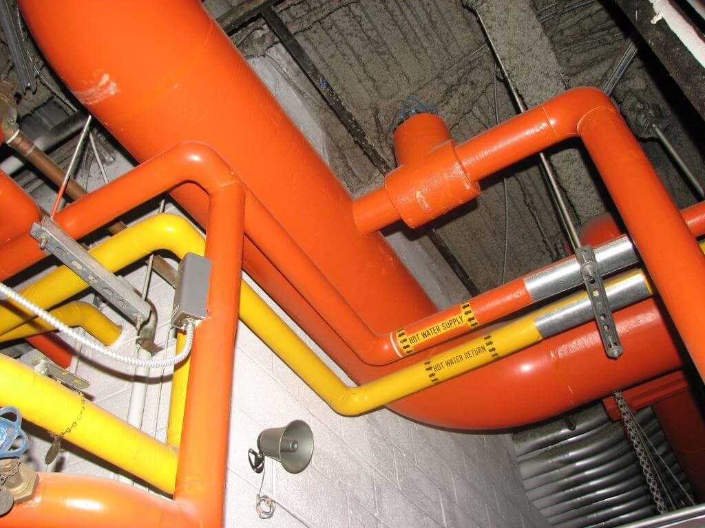 orange and yellow pipes for hot water heating system