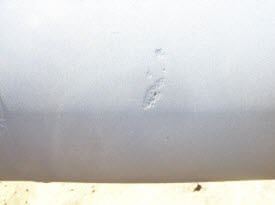 ​Figure 1. Salt-induced pitting before and after surface cleaning (not the same location).​