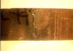 Figure 1. Stress corrosion cracking caused by chlorides leaching from insulation onto stainless steel's hot metal surface.