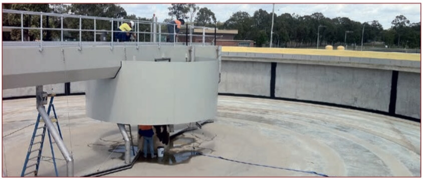 Figure 1. A wastewater treatment plant settlement tank being prepared for protection by a sprayed pure polyurea coating.